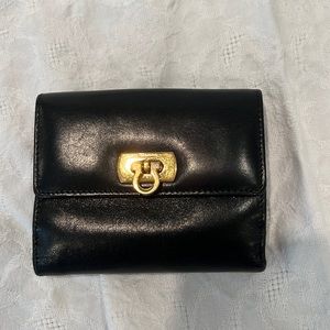 Ferragamo Small Continental Wallet in black leather with gold tone hardware